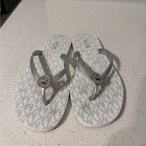 Michael Kors Silver and White Logo Flip Flops